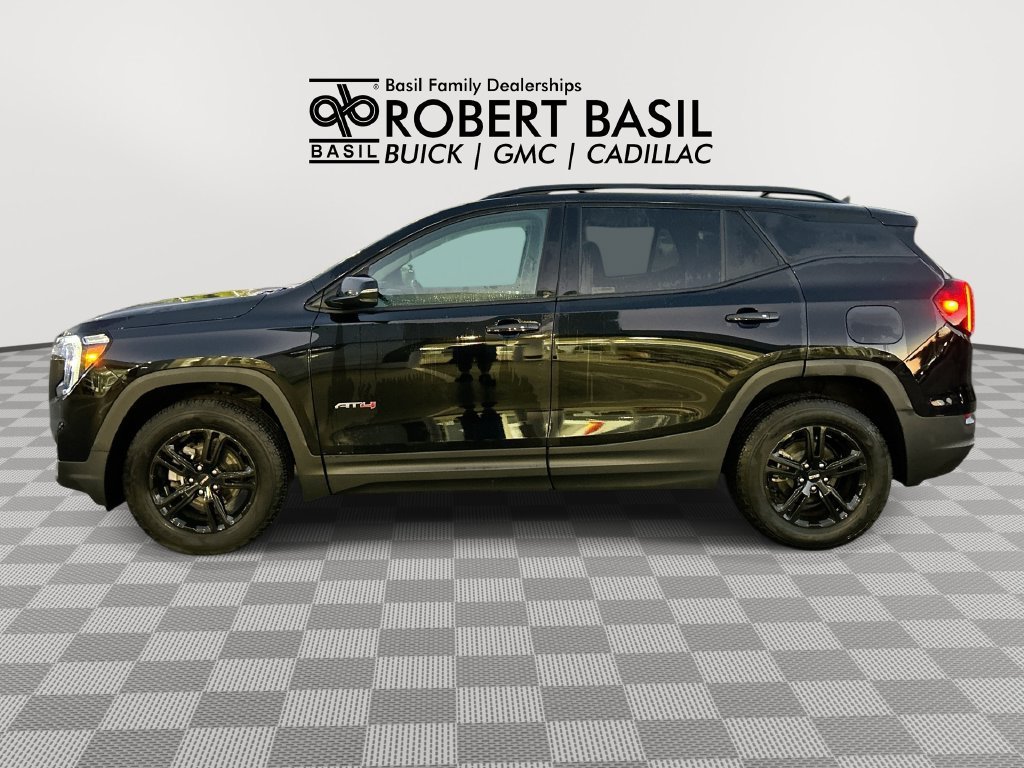 Used 2024 Ebony Twilight Metallic GMC AT4 image 5