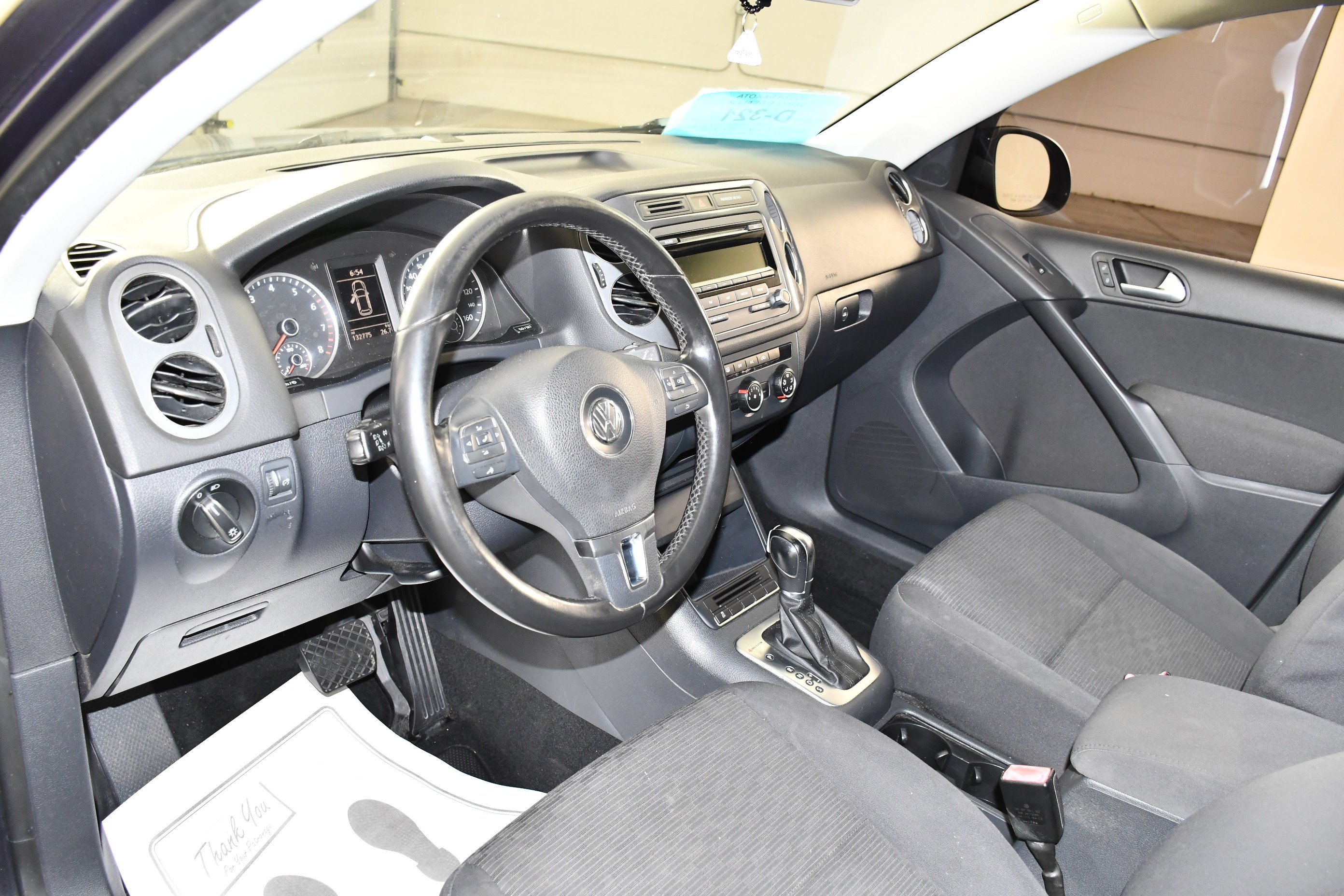 Used 2013 Volkswagen Tiguan S with VIN WVGBV3AX5DW610921 for sale in Sioux Falls, SD