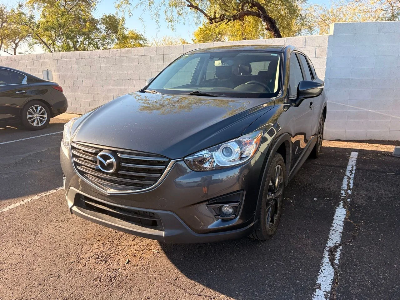 Used 2016 Meteor Gray Mazda Grand Touring image 1