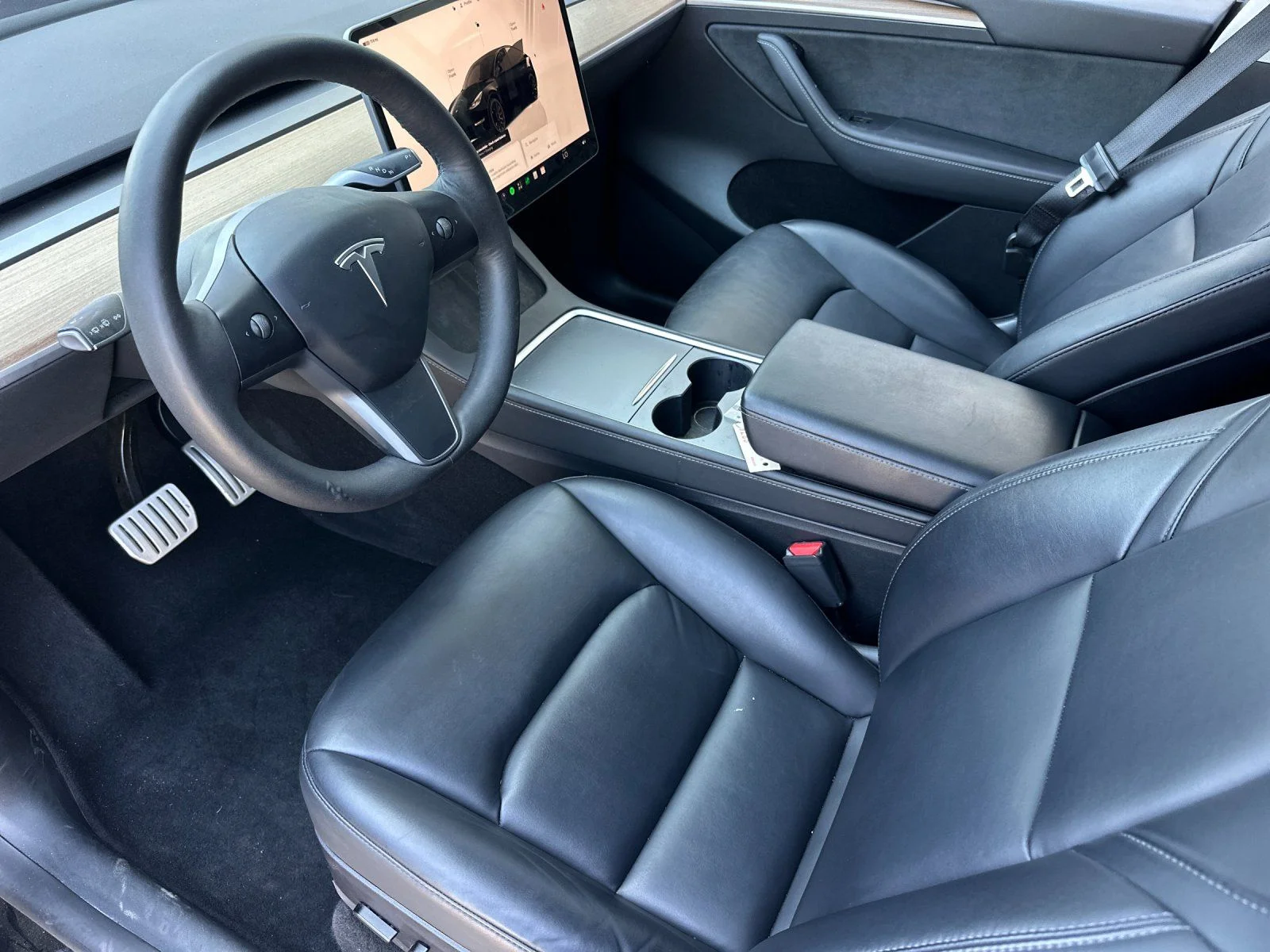 Used 2022 Solid Black Tesla Performance image 9