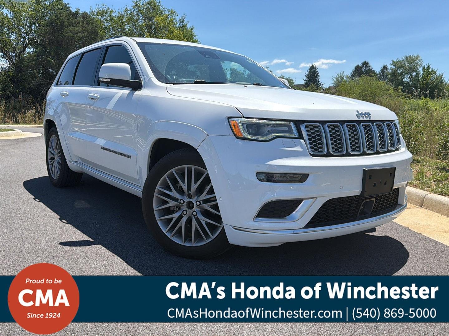 Used 2018 Ivory 3-Coat Jeep Summit image 1