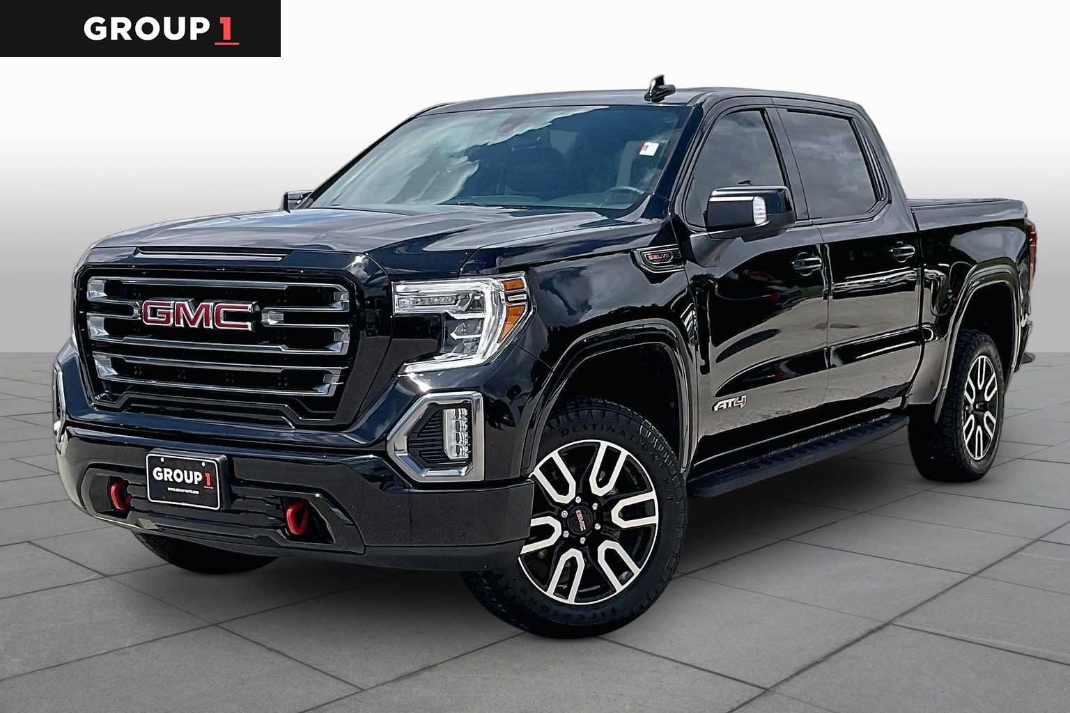 Used 2021 ONYX BLACK GMC AT4 image 1