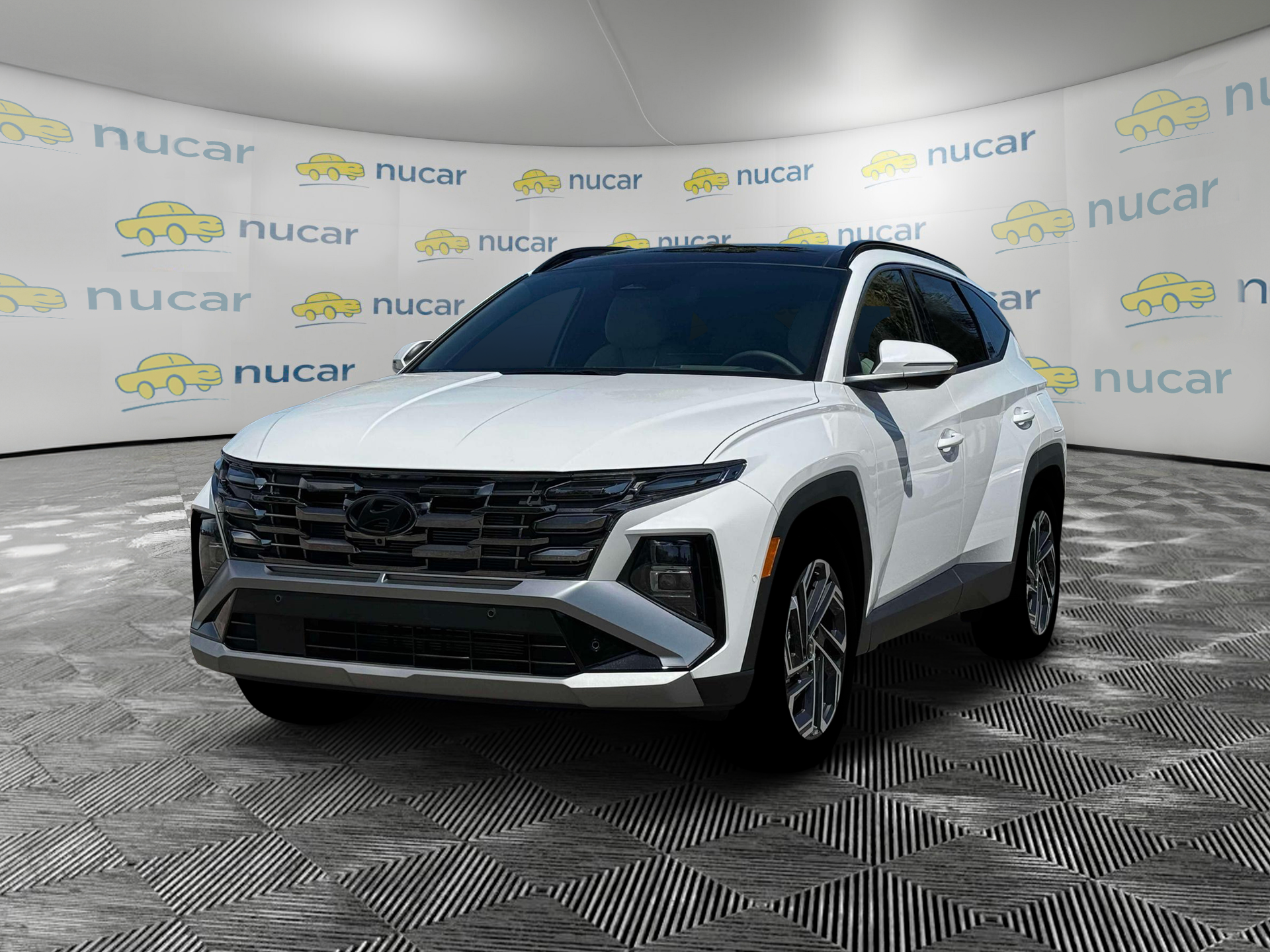 2026 Hyundai Tucson Limited in White at Nucar — photo 1