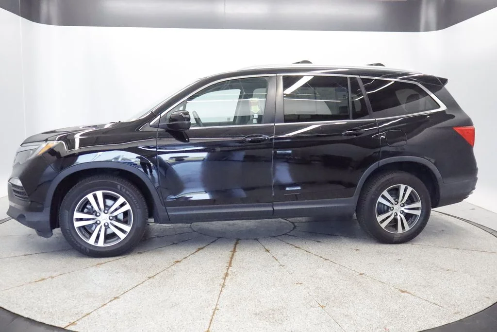 Used 2016 Honda Pilot EX-L with VIN 5FNYF6H55GB005730 for sale in Coon Rapids, Minnesota