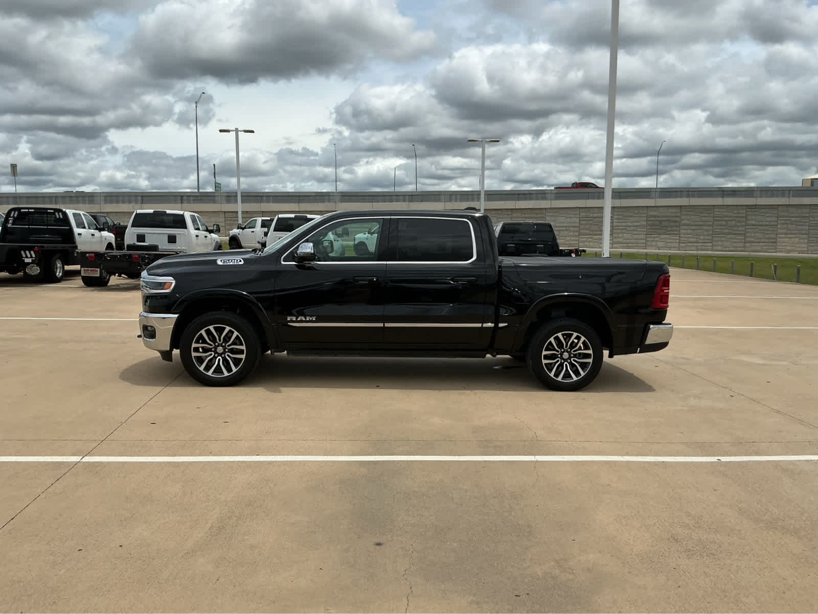 Used 2025 Diamond Black Crystal Pearlcoat Ram Limited image 14