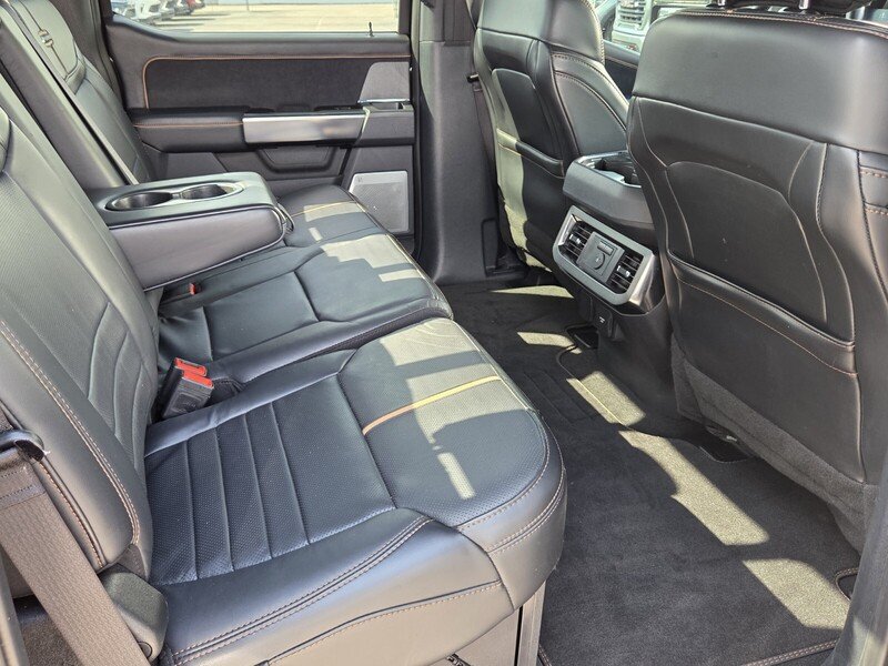 Used 2024 Black Metallic FORD PLATINUM 4WD CREW CAB 6.75