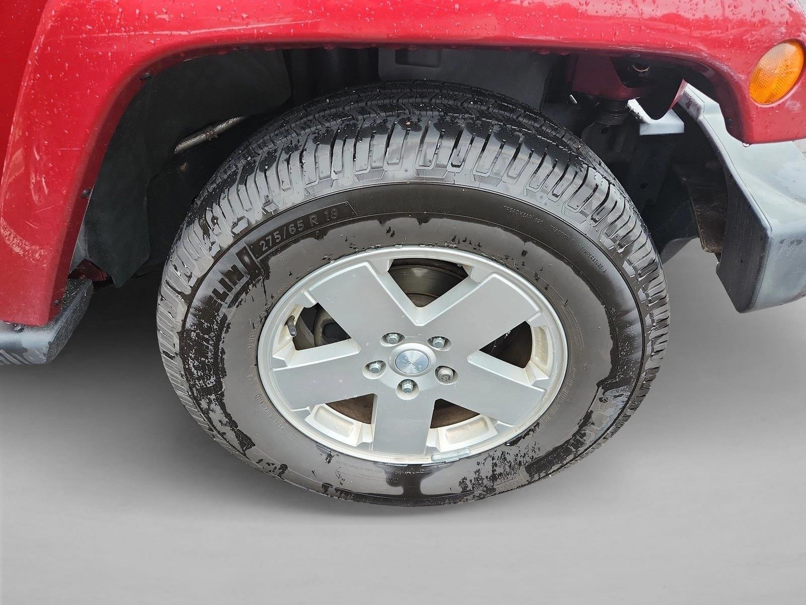 Used 2012 Deep Cherry Red Crystal Pearl Jeep Sahara image 4