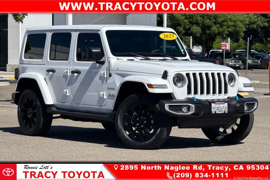 Used 2023 White Jeep Sahara 4xe image 1