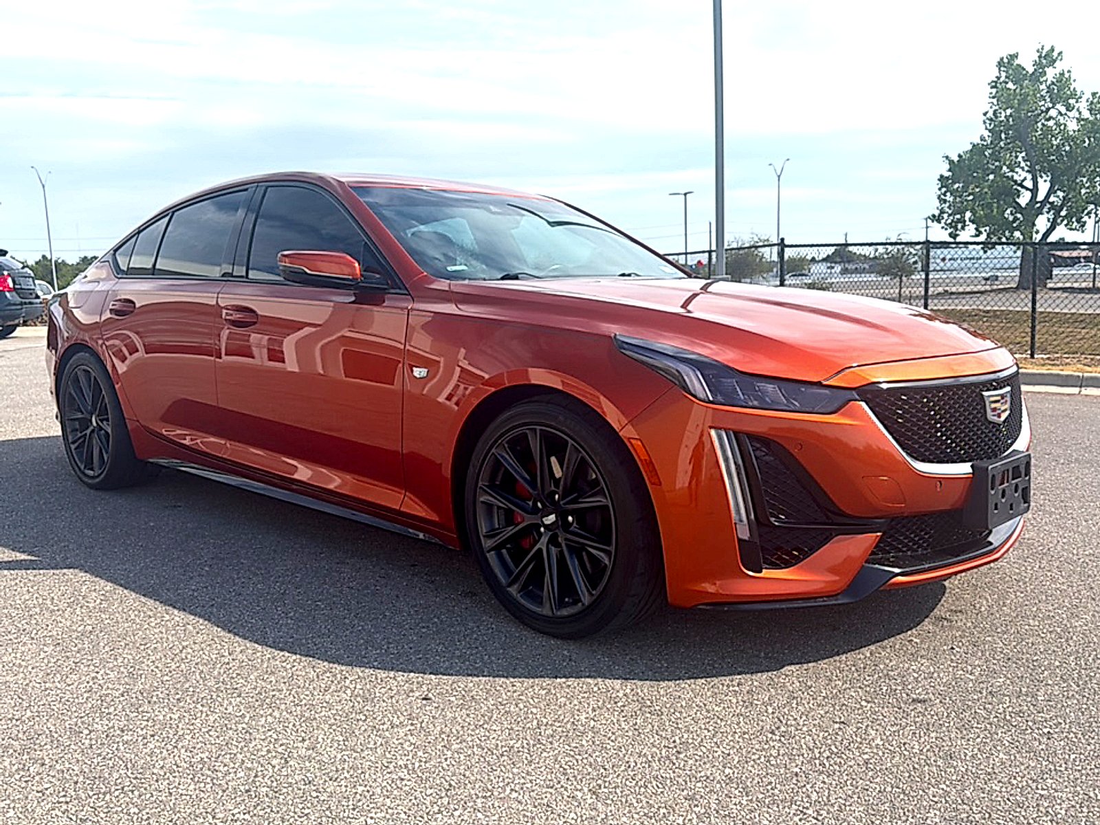 Used 2022 Blaze Orange Metallic Cadillac Sport image 3