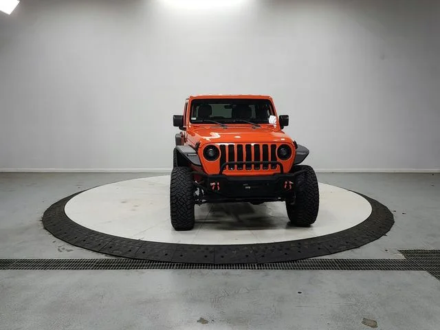 Used 2018 Orange Jeep Unlimited Sahara image 2