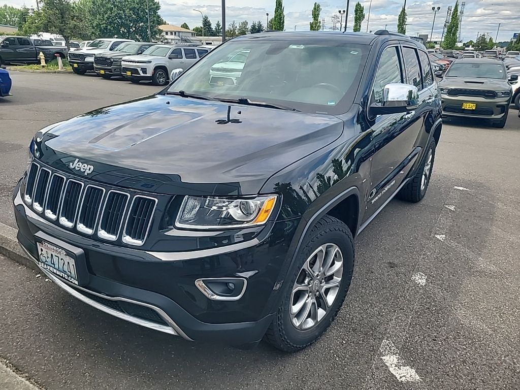 Used 2014 Green Jeep Limited image 1