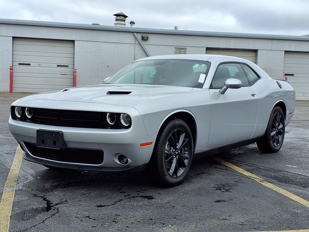 Used 2023 Dodge Challenger SXT with VIN 2C3CDZGG0PH670554 for sale in Kansas City