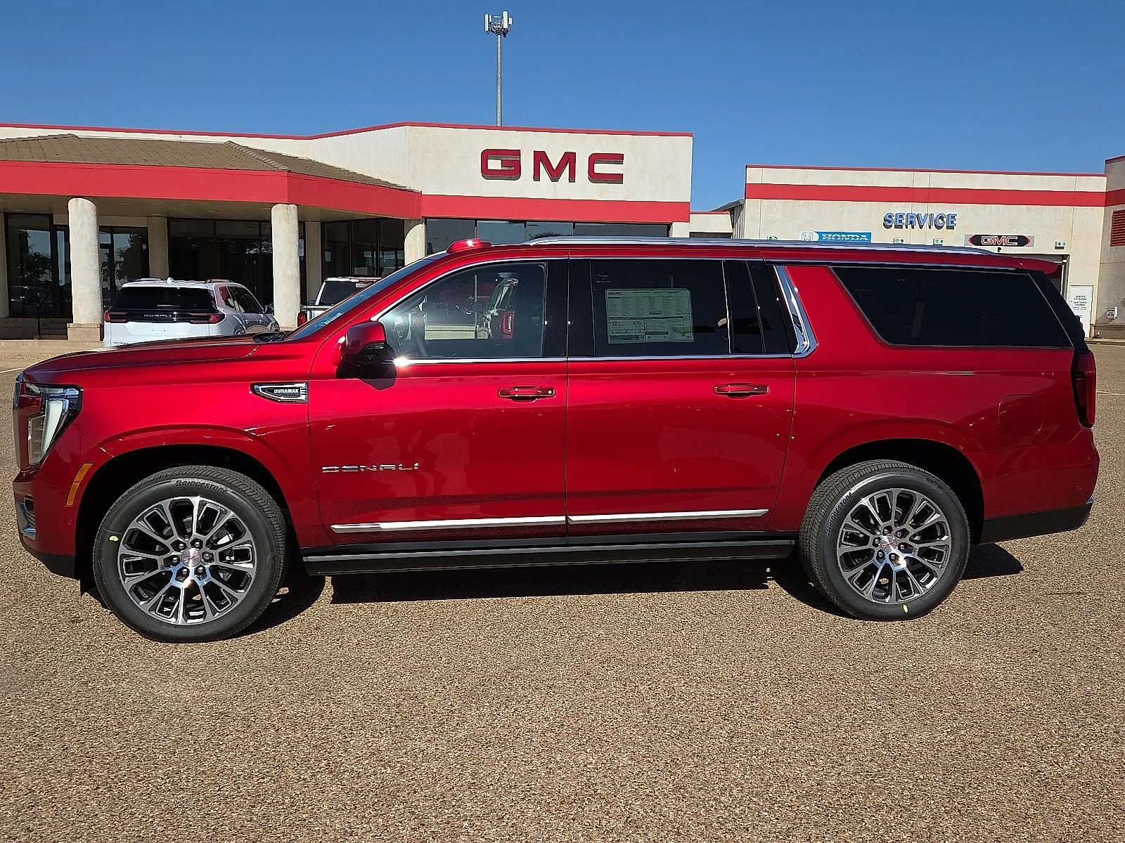 New 2026 Volcanic Red Tintcoat GMC Denali image 2