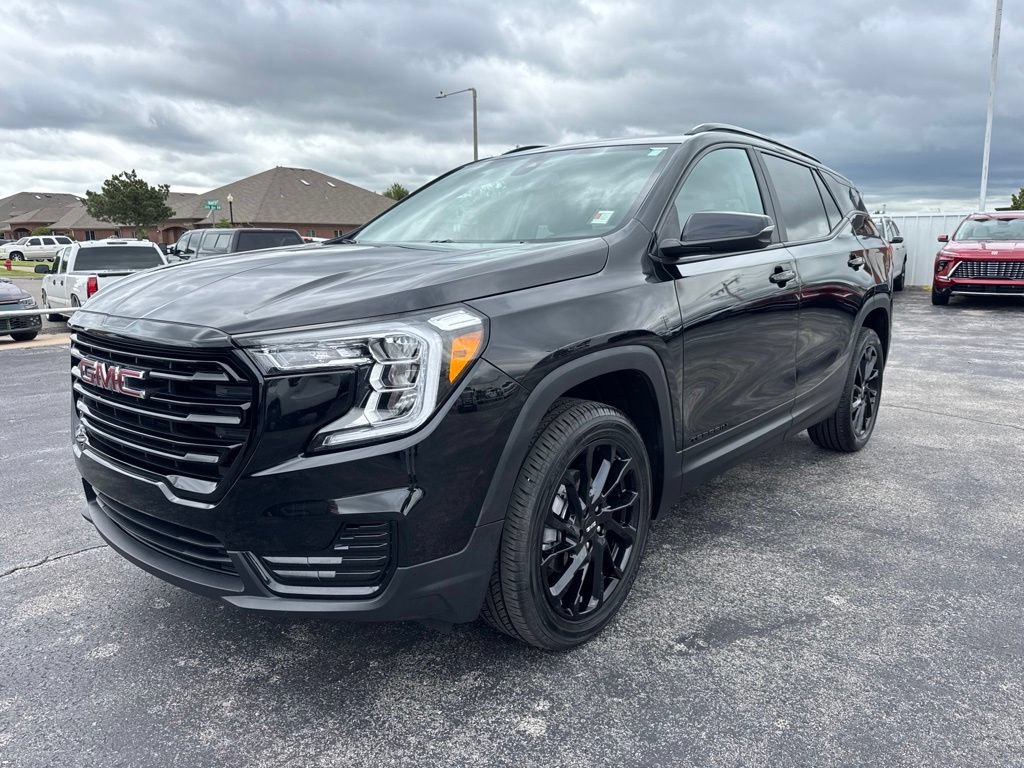 Used 2024 Ebony Twilight Metallic GMC SLE image 2