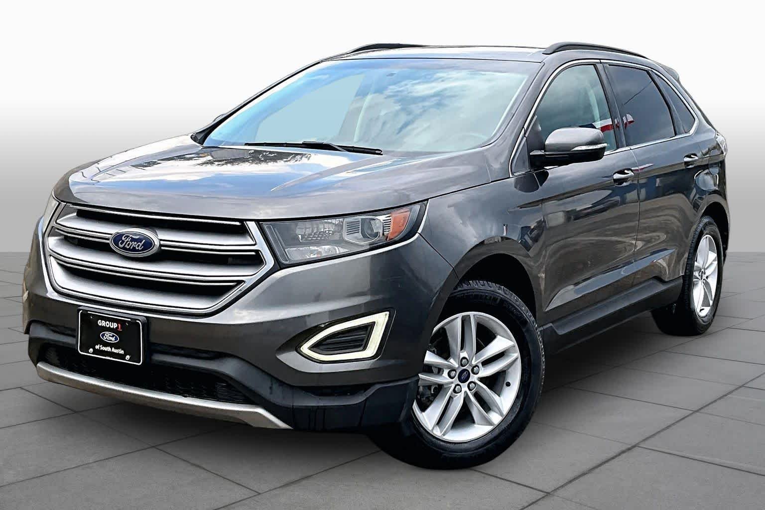 Used 2015 Magnetic Metallic Ford SEL image 37
