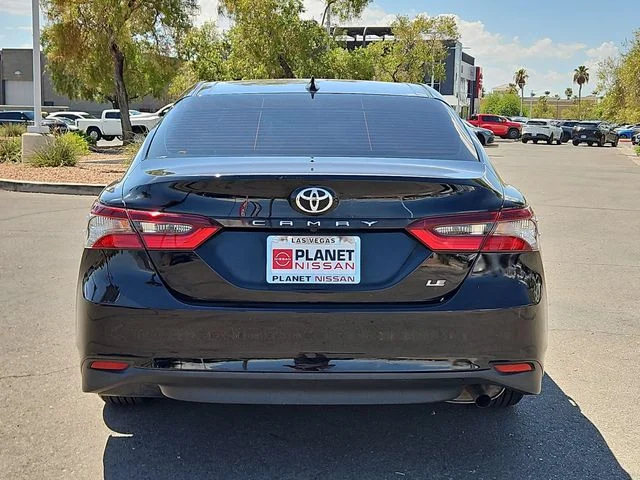 Used 2023 Midnight Black Metallic Toyota LE image 7