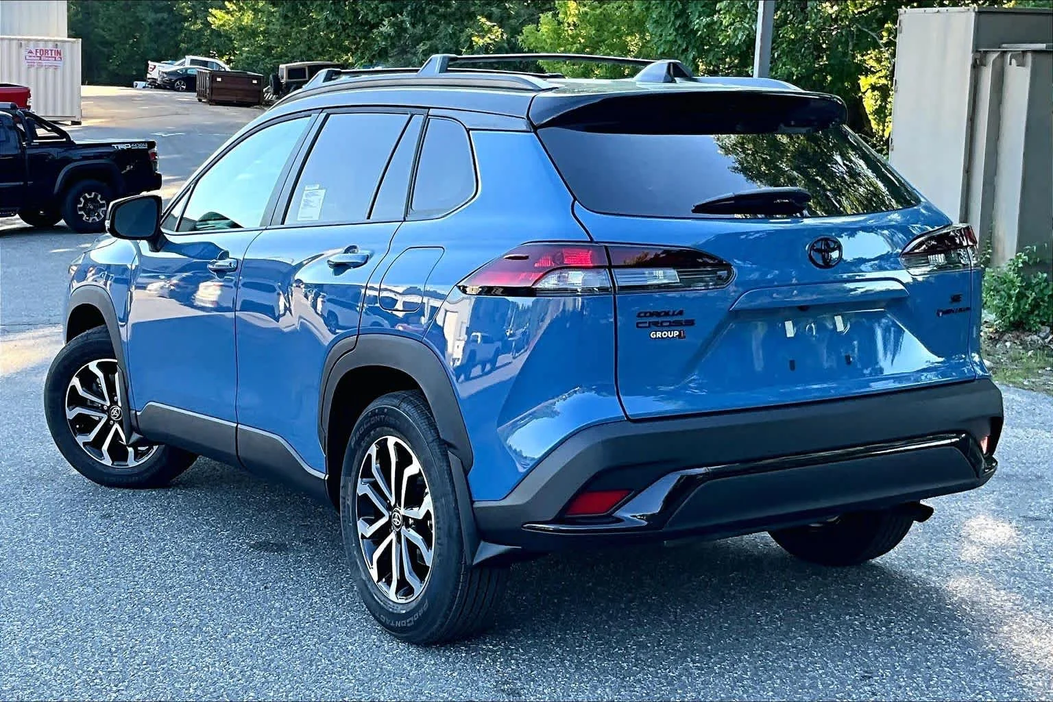 New 2026 Cavalry Blue/Jet Black Toyota Hybrid SE image 11