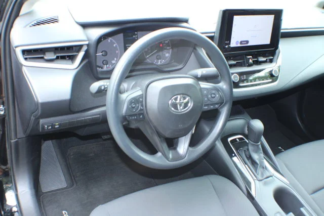 Used 2025 Midnight Black Metallic Toyota LE image 7