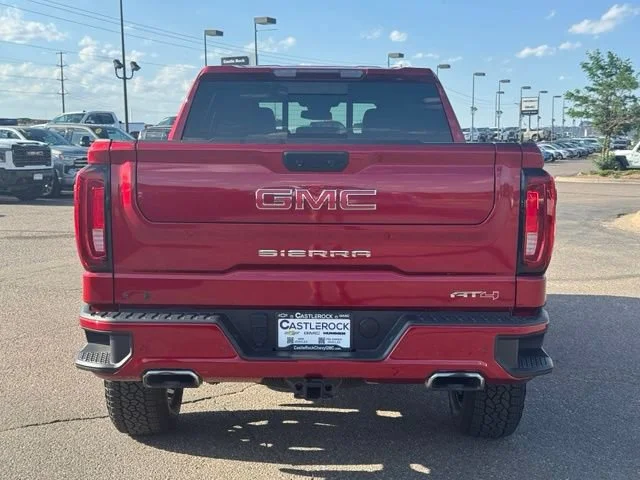Used 2023 Volcanic Red Tintcoat GMC AT4 image 4