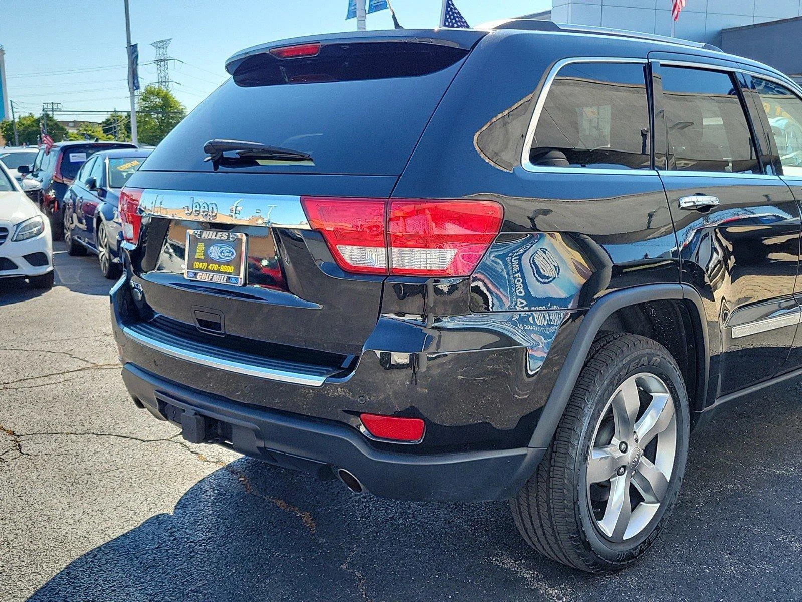 Used 2013 Brilliant Black Crystal Pearl Jeep Overland image 8