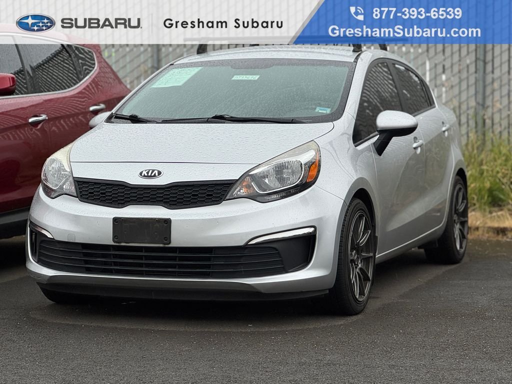 Used 2016 Bright Silver Metallic Kia LX image 1