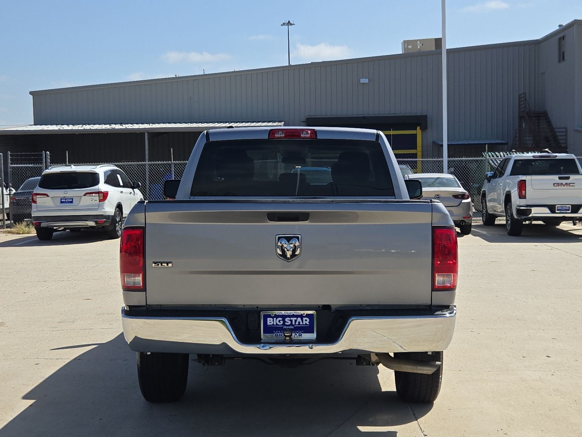 Used 2024 Billet Silver Metallic Clearcoat Ram SLT image 4