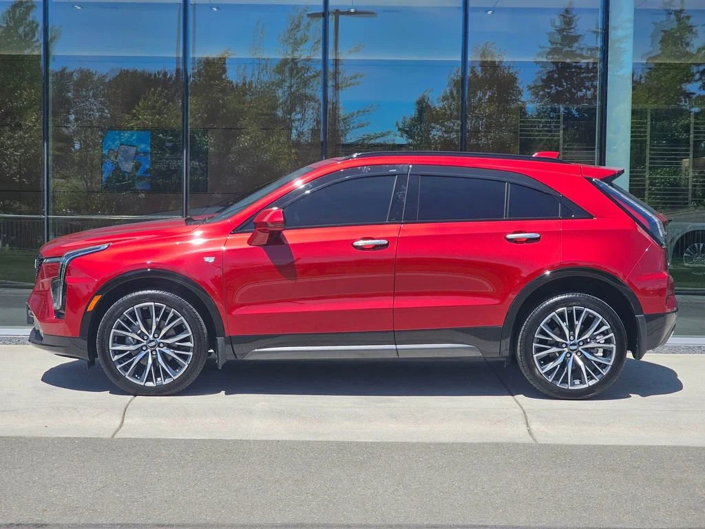 Used 2024 Radiant Red Tintcoat Cadillac Sport image 2
