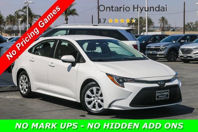 Used 2024 White Toyota LE image 1