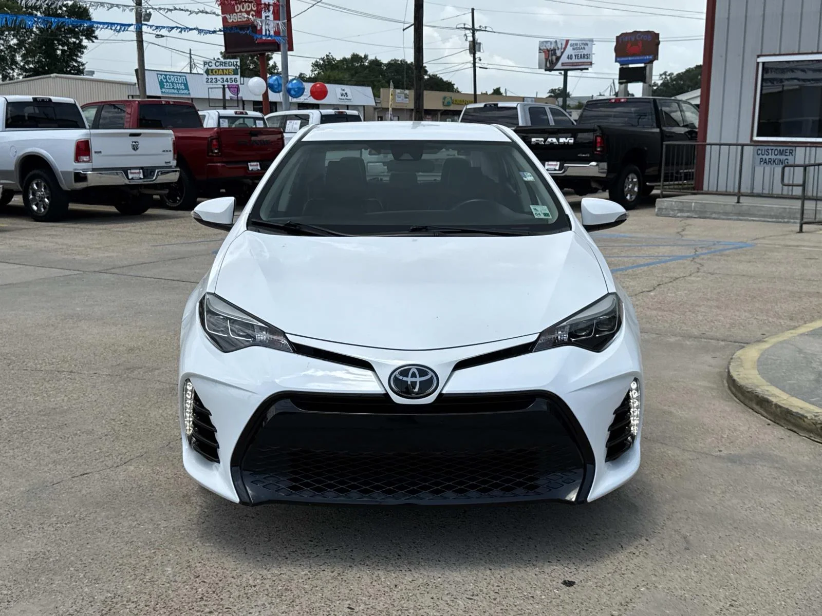 Used 2019 Super White Toyota LE image 2