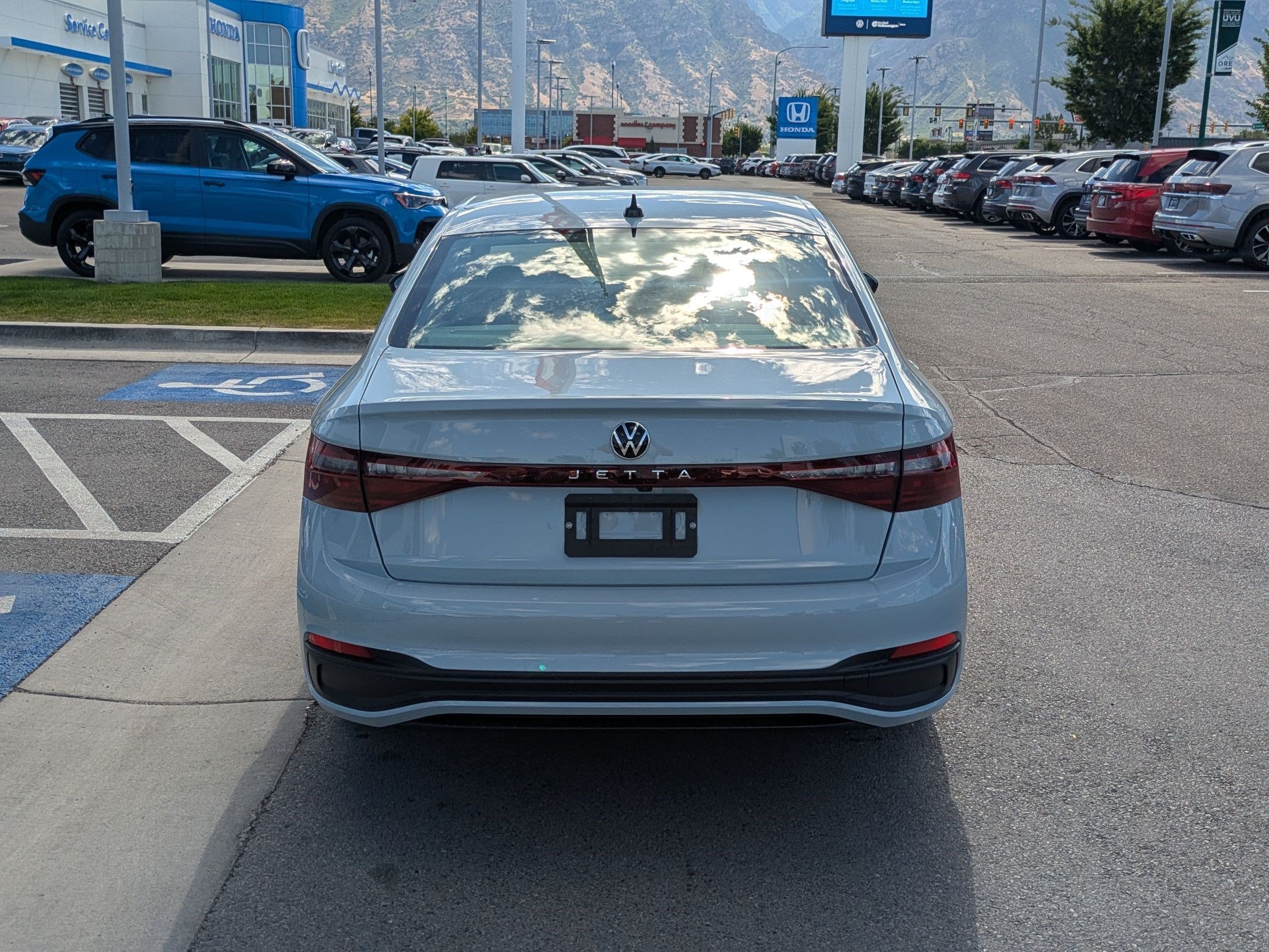 New 2026 Monument Gray Volkswagen Sport image 4