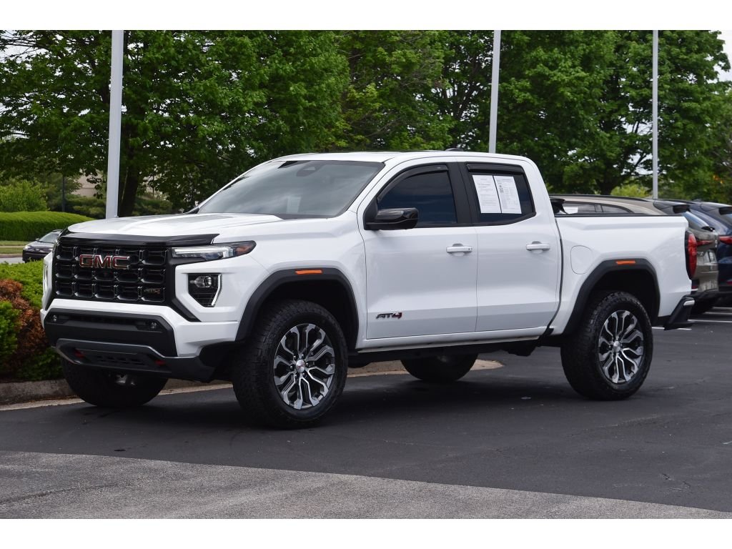 Used 2024 Summit White GMC 4WD AT4 image 7