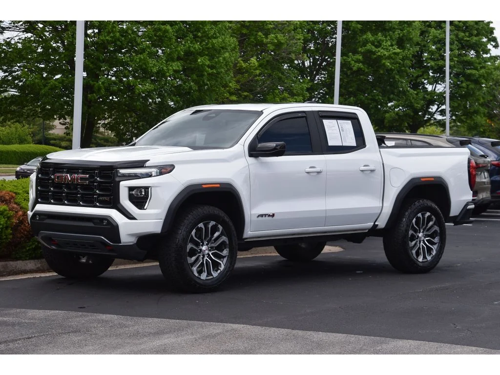 Used 2024 Summit White GMC 4WD AT4 image 7