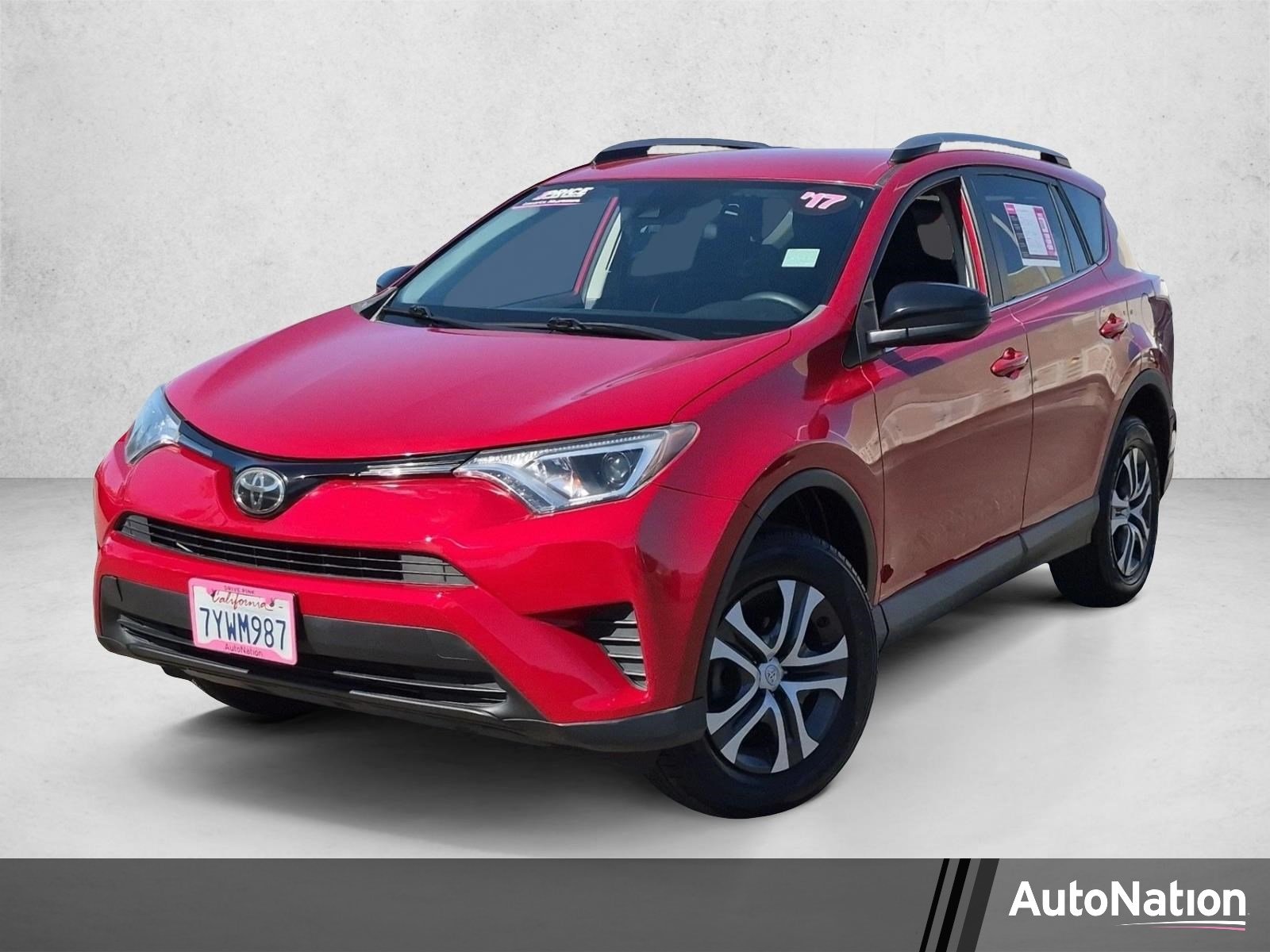 Used 2017 Barcelona Red Metallic Toyota LE image 1