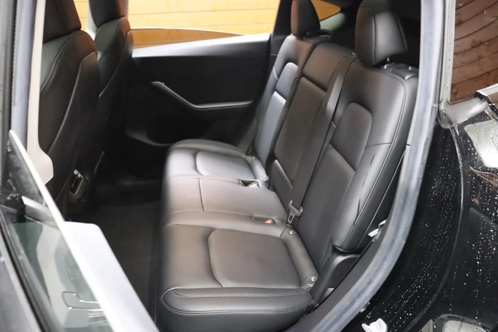 Used 2022 Solid Black Tesla Performance image 35