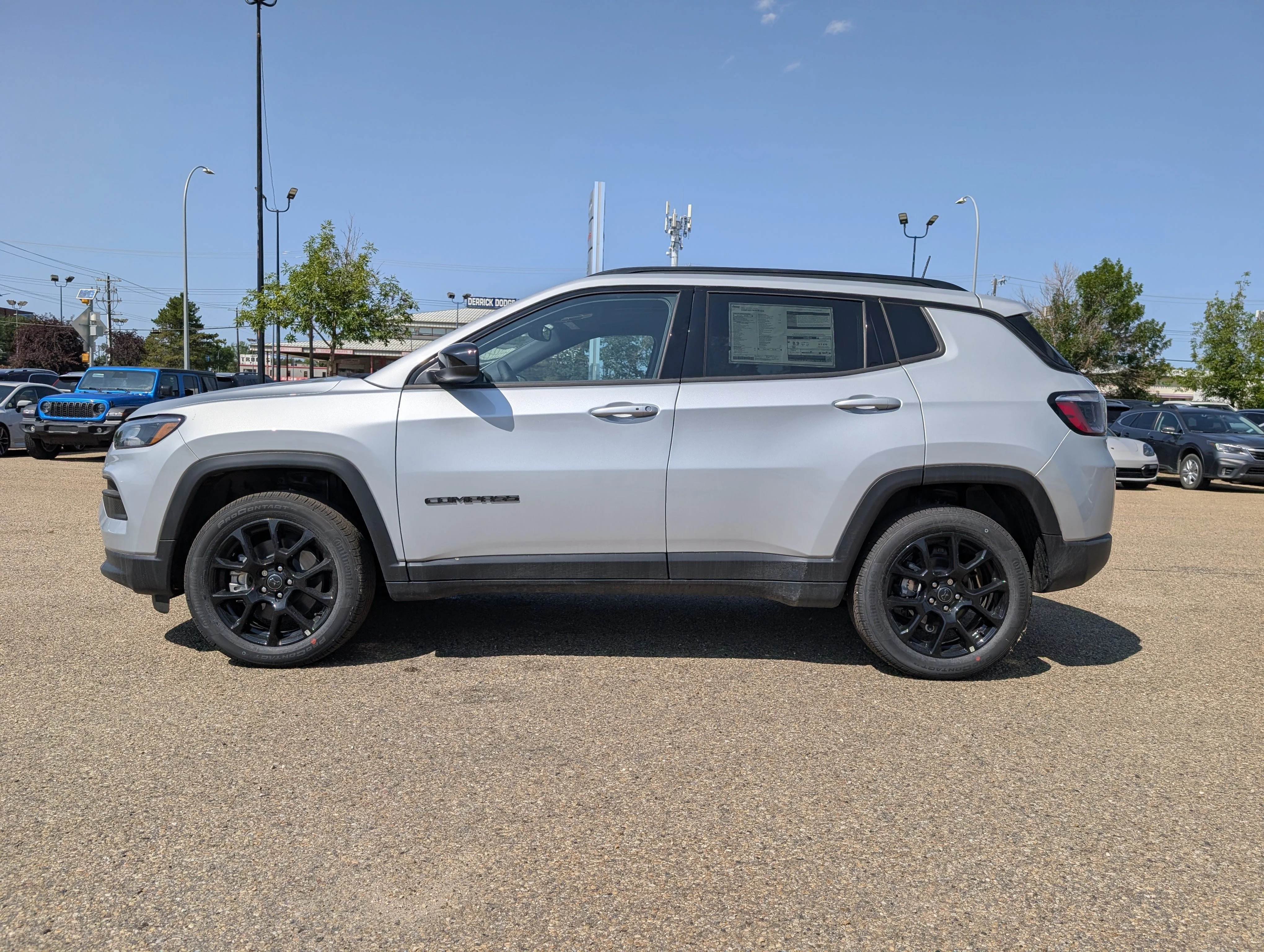 New 2026 Silver Zynith Metallic Jeep North image 3