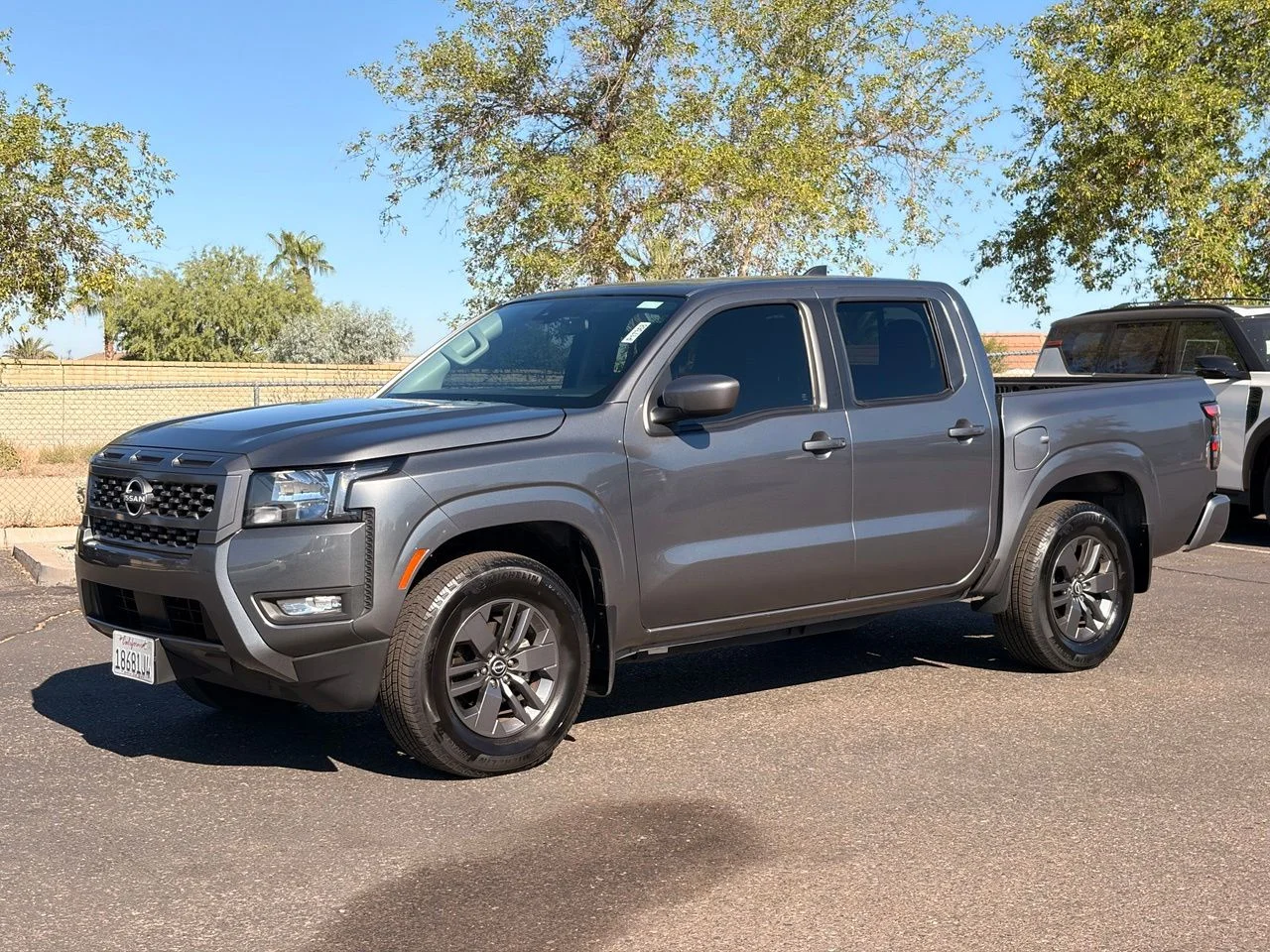 Used 2025 Gun Metallic Nissan SV image 1