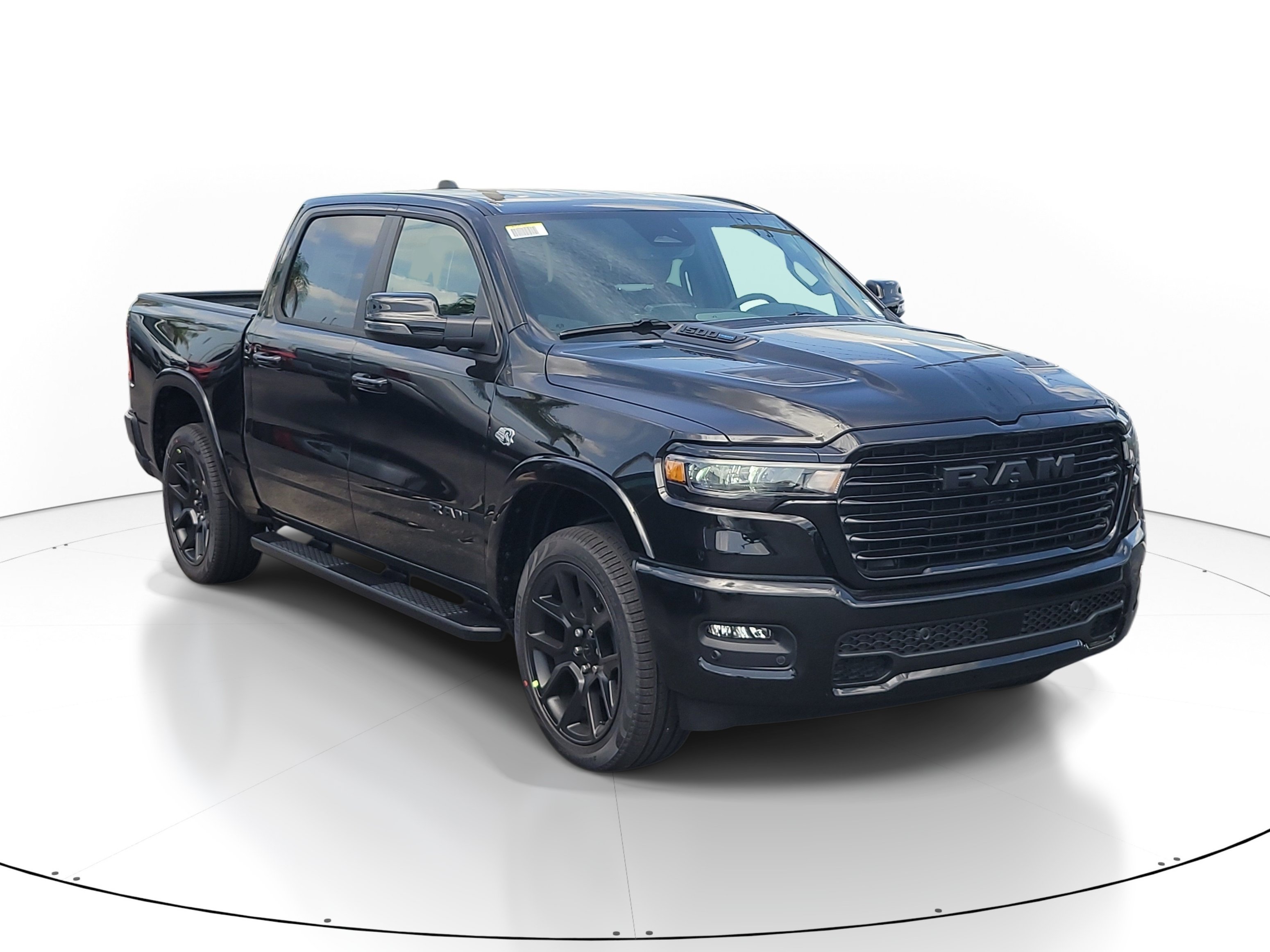 New 2026 Diamond Black Crystal Pearl-Coat Exterior Paint RAM Laramie image 2