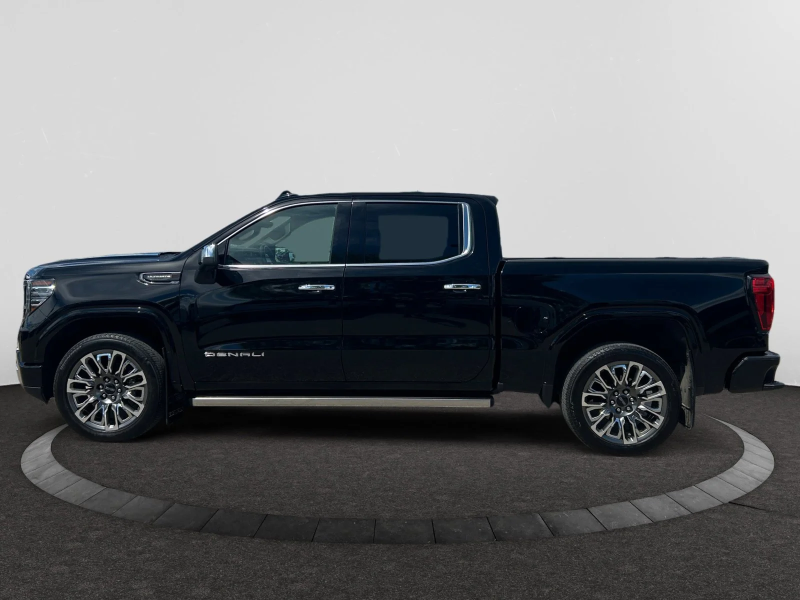 Used 2025 Black GMC Denali Ultimate Crew Cab image 2