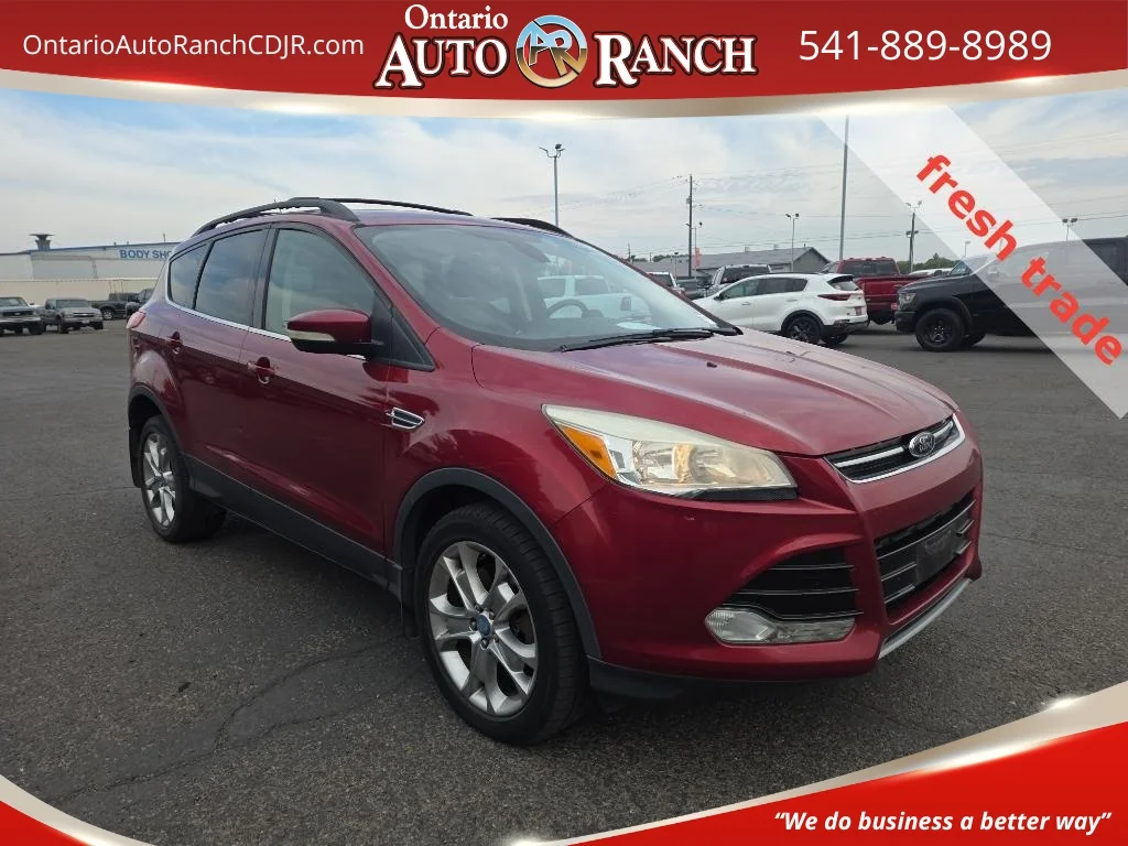 Used 2013 Ruby Red Clearcoat Ford SEL image 1
