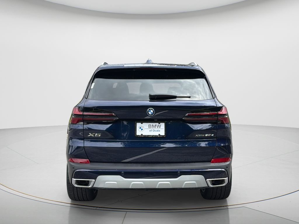 New 2026 Tanzanite Blue II Metallic BMW xDrive50e image 11