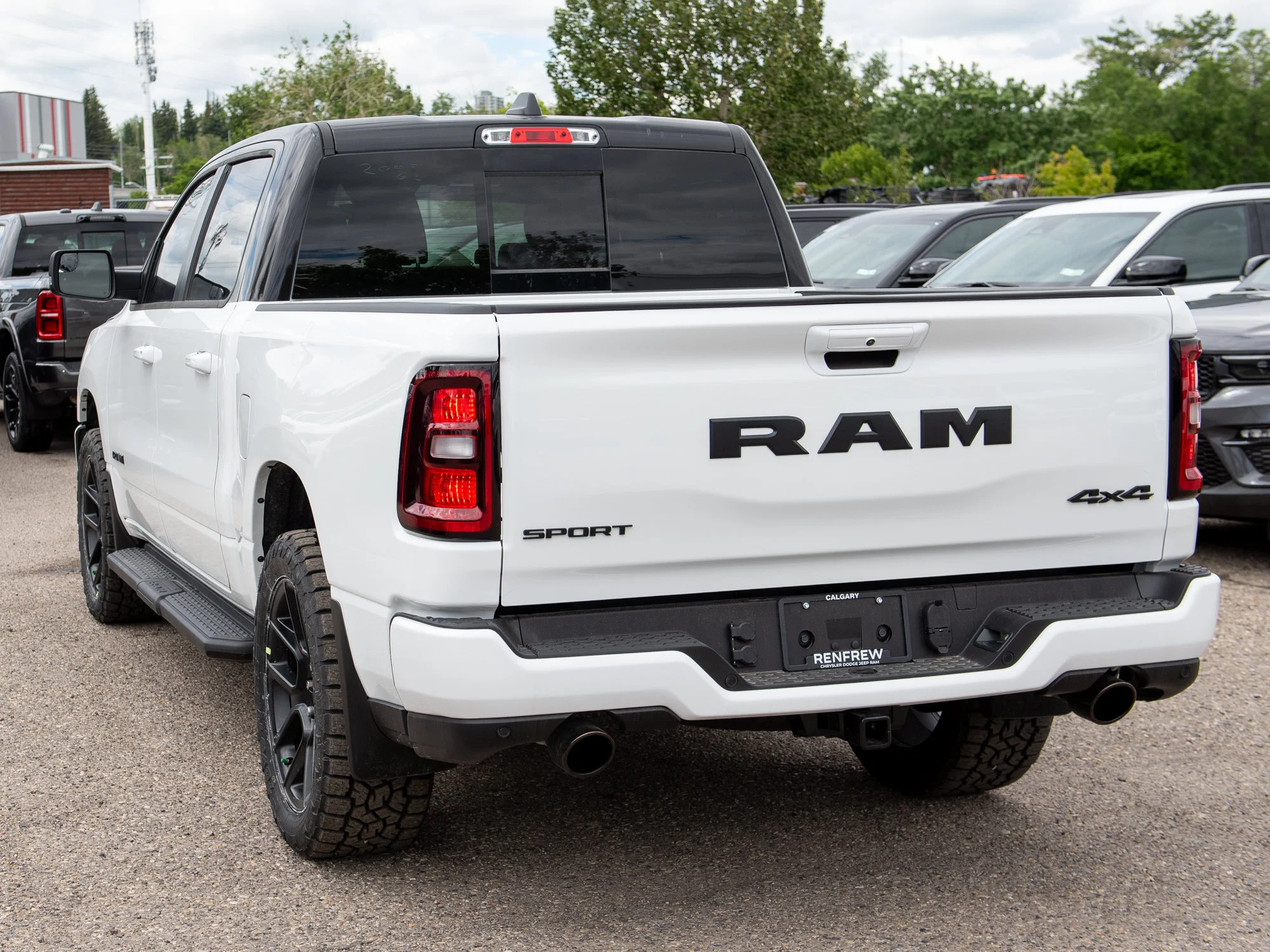 New 2026 White RAM Sport*, 2 Inch Lift, 33 Inch Tires image 4