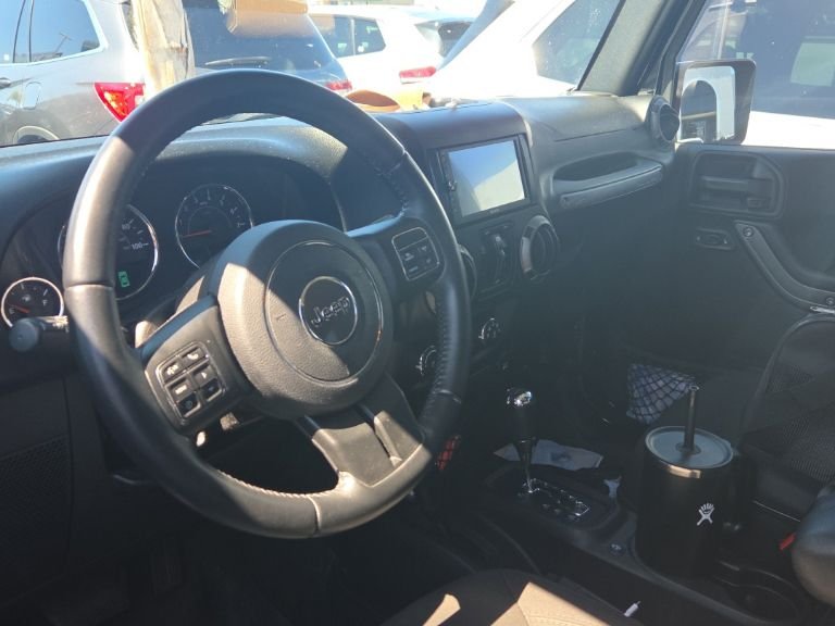 Used 2016 Black Jeep Unlimited Sport image 22