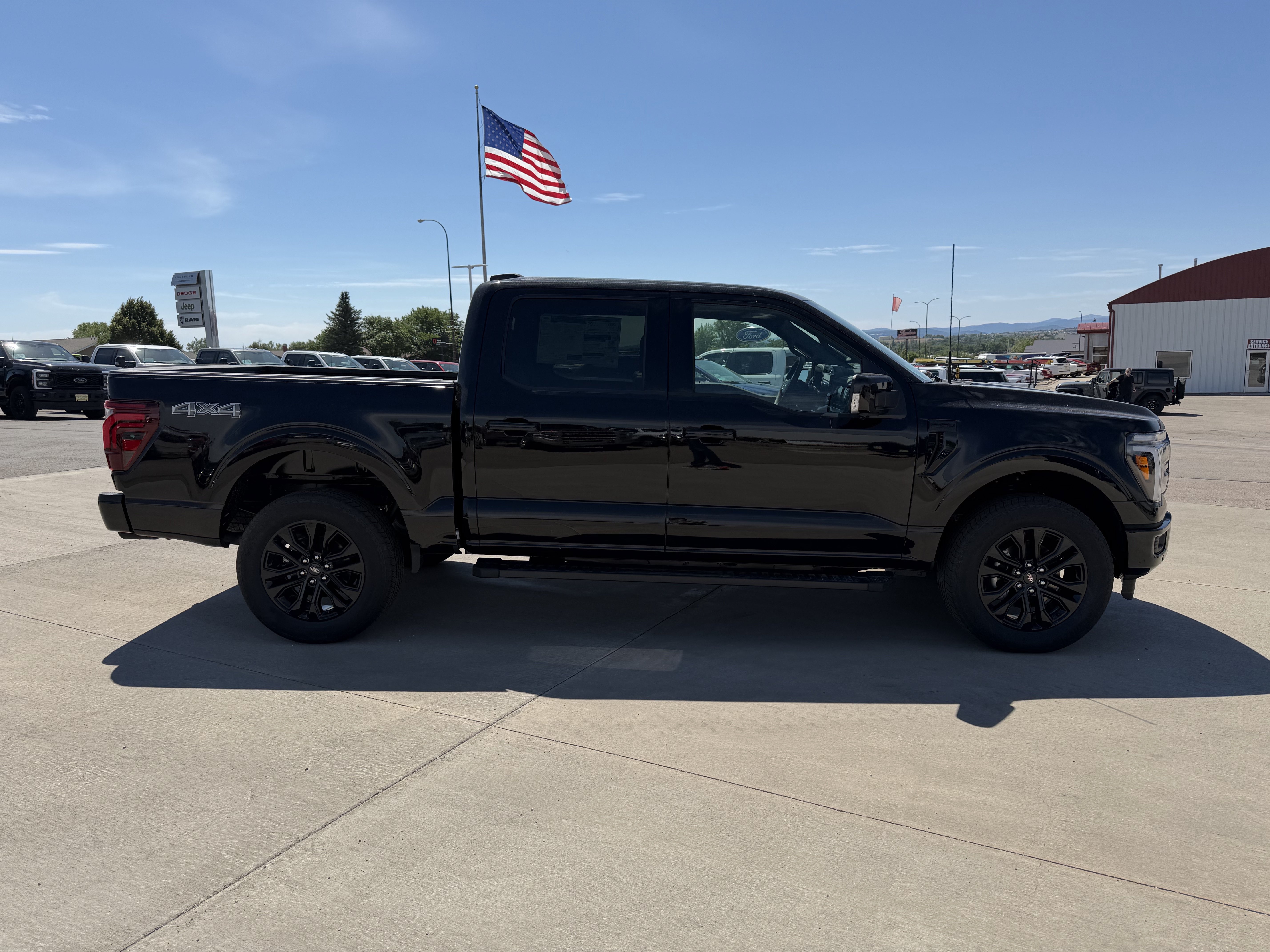 New 2026 Agate Black Metallic Ford LARIAT image 4