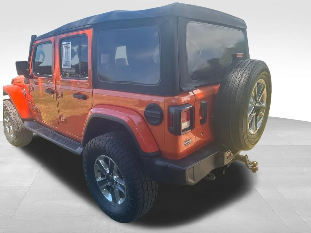 Used 2018 Orange Jeep Unlimited Sahara image 17