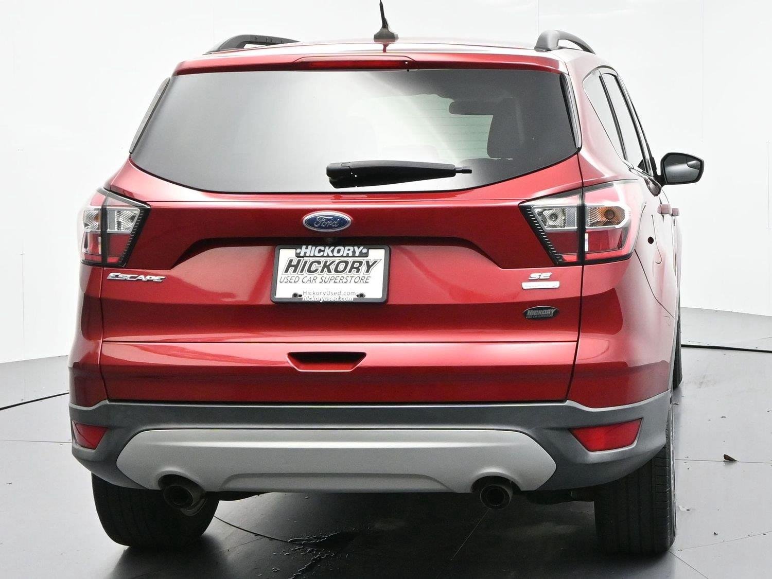 Used 2018 Ruby Red Metallic Tinted Clearcoat Ford SE image 6