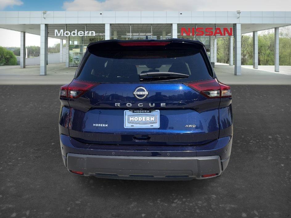 Used 2025 Deep Ocean Blue Pearl Nissan SV image 4