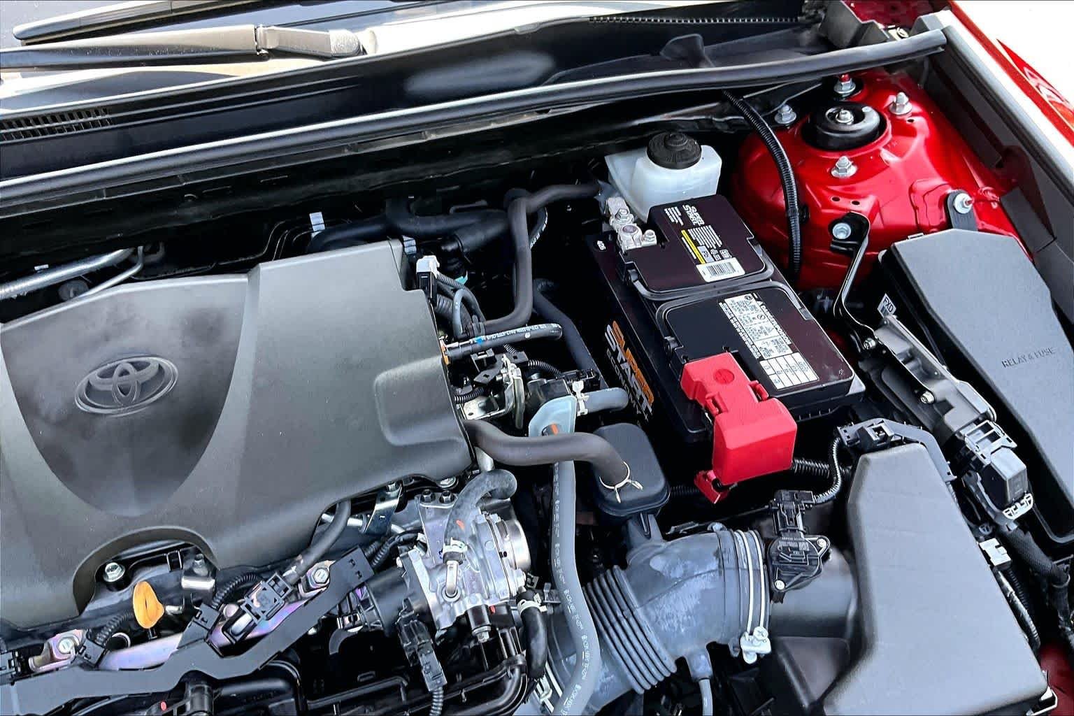 Used 2023 Supersonic Red Toyota LE image 32