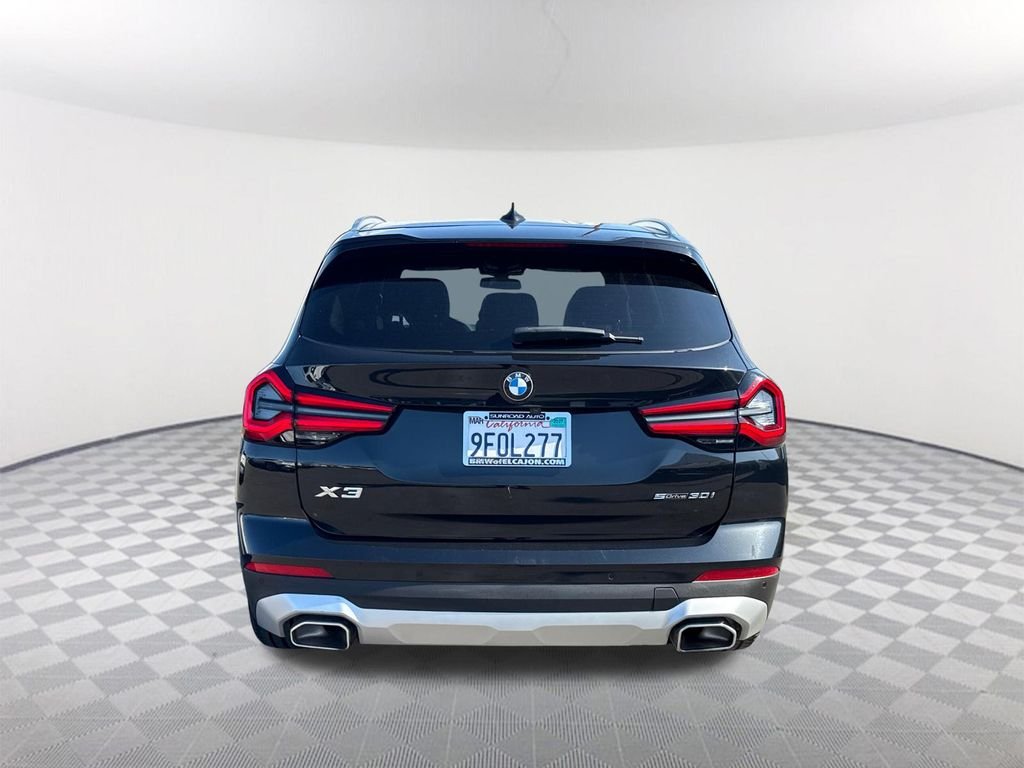 Used 2023 Black Sapphire Metallic BMW sDrive30i image 5