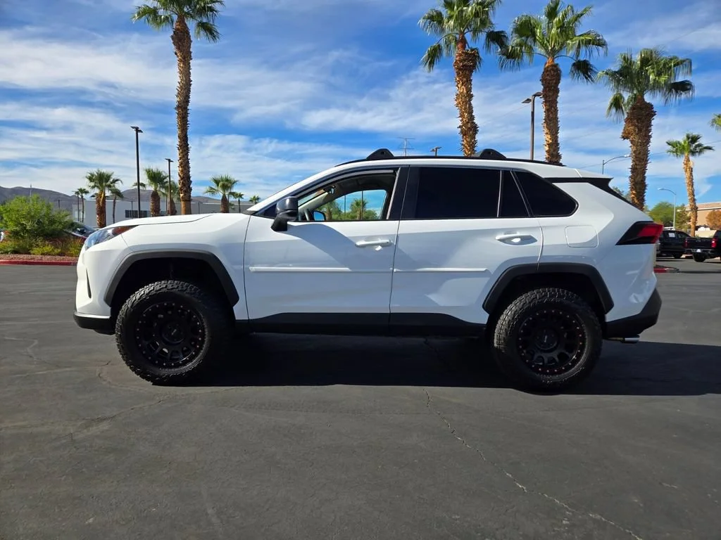 Used 2021 Super White Toyota LE image 3