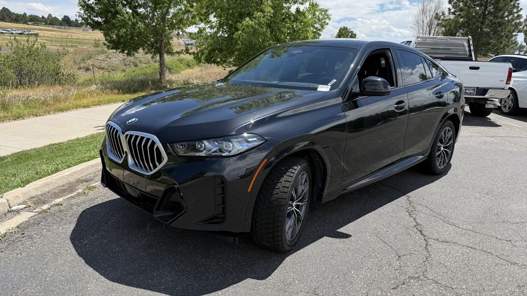 Used 2024 Black BMW xDrive40i image 2
